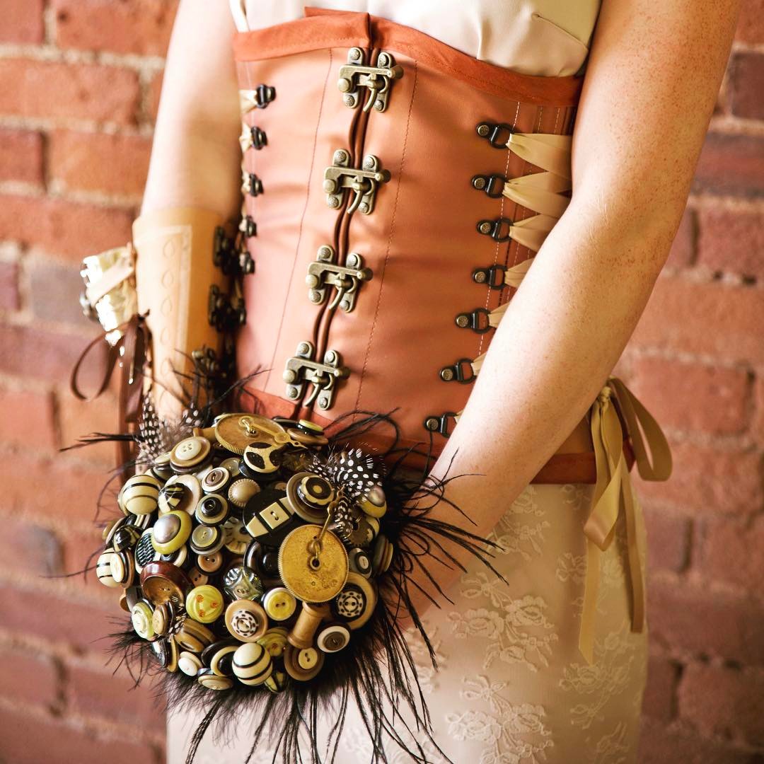 {steamPunk}
photo | @sagestudiosphotography 
#steampunk #vintage #buttonbouquet #corset #custom #getcreative #wickedcool #lotusfloraldesigns #photoshoot #badassbride